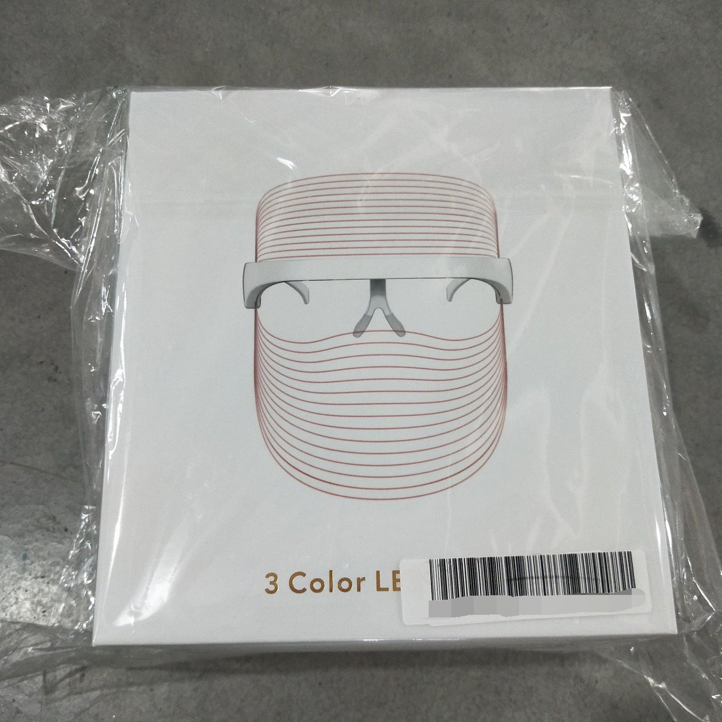 LED facial rejuvenation device with brand logo